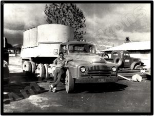 International Trucks Collectible Metal Sign: IH Tractor Trailer w/ Driver - Image 1