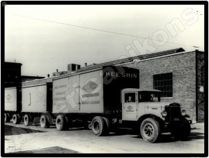 International Trucks Collectible Metal Sign: Keeshin Carriers Tandem Tractor Trailer