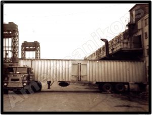 International Trucks Collectible Metal Sign: East Land Trucking Tractor Trailer - Image 1