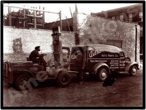 International Trucks Collectible Metal Sign: Aetna Auto Parts Delivery Truck - Chicago