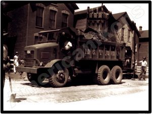 International Trucks Collectible Metal Sign: Thomas McQueen Company Dump Truck
