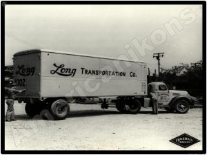 International Trucks Collectible Metal Sign: Long Transportation Tractor Trailer