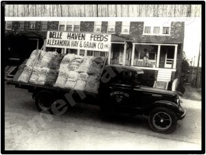 International Trucks Collectible Metal Sign: Alexandria Hay & Feed Truck