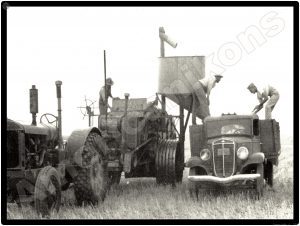 International Trucks Collectible Metal Sign: Grain Truck in Harvest Operation - Image 1