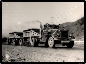 International Trucks Collectible Metal Sign: Tandem Trailer Gravel Hauler